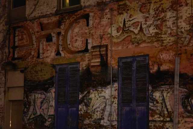 peeling paint, purple shutters